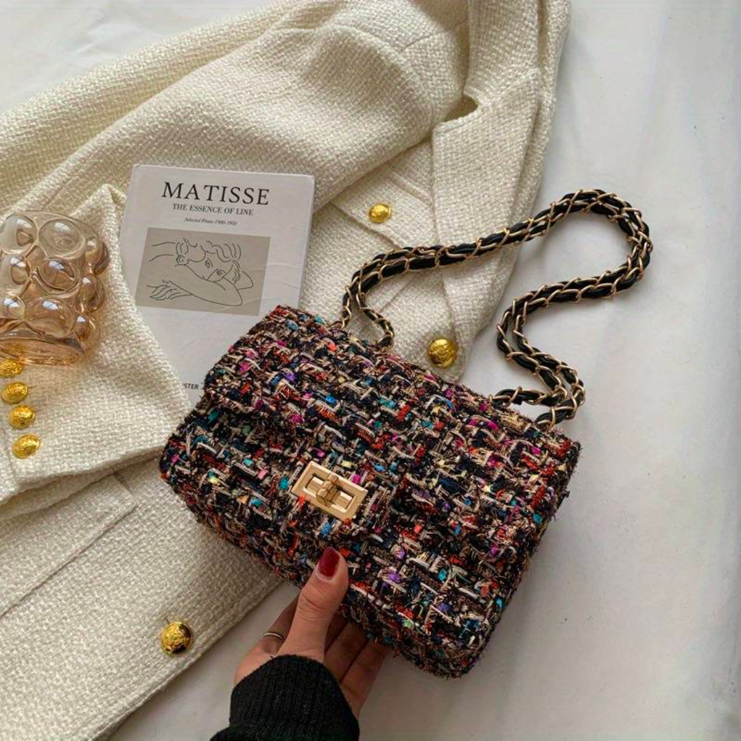 Nærbillede af tweed-materiale og finish på skuldertaske