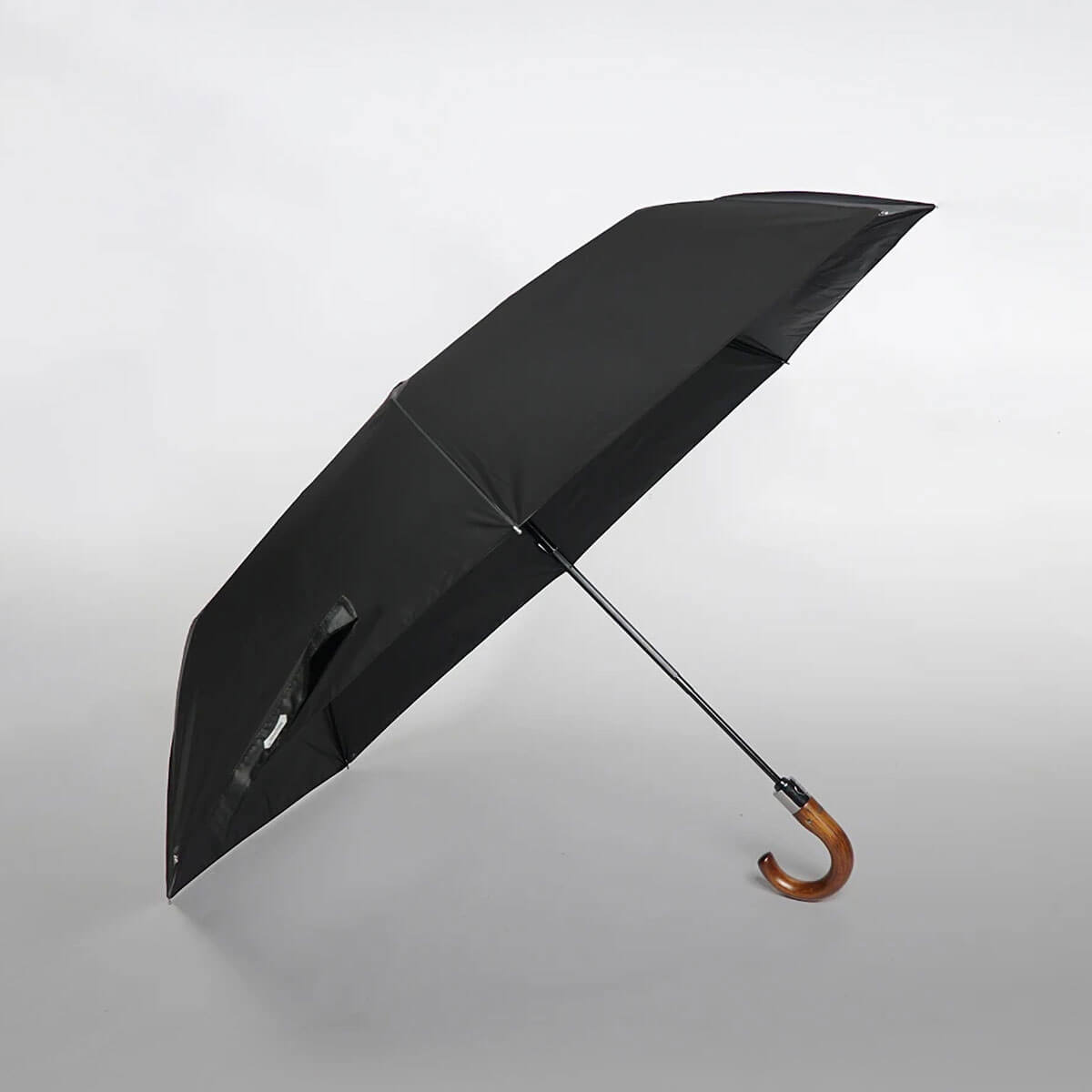 Holdbart aluminium- og fiberglasstél på kompakt foldeparaply
