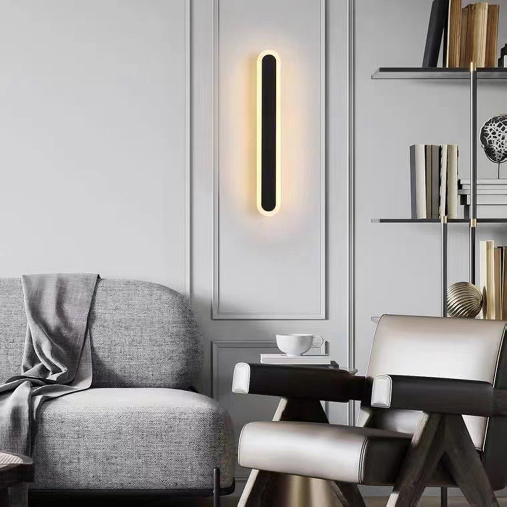 LED-væglampe med varm hvid belysning på husfacade