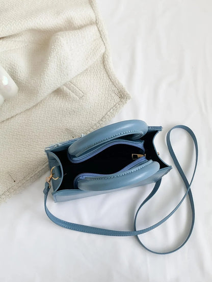 Tote bag i denim med håndtag – bæremuligheder vist