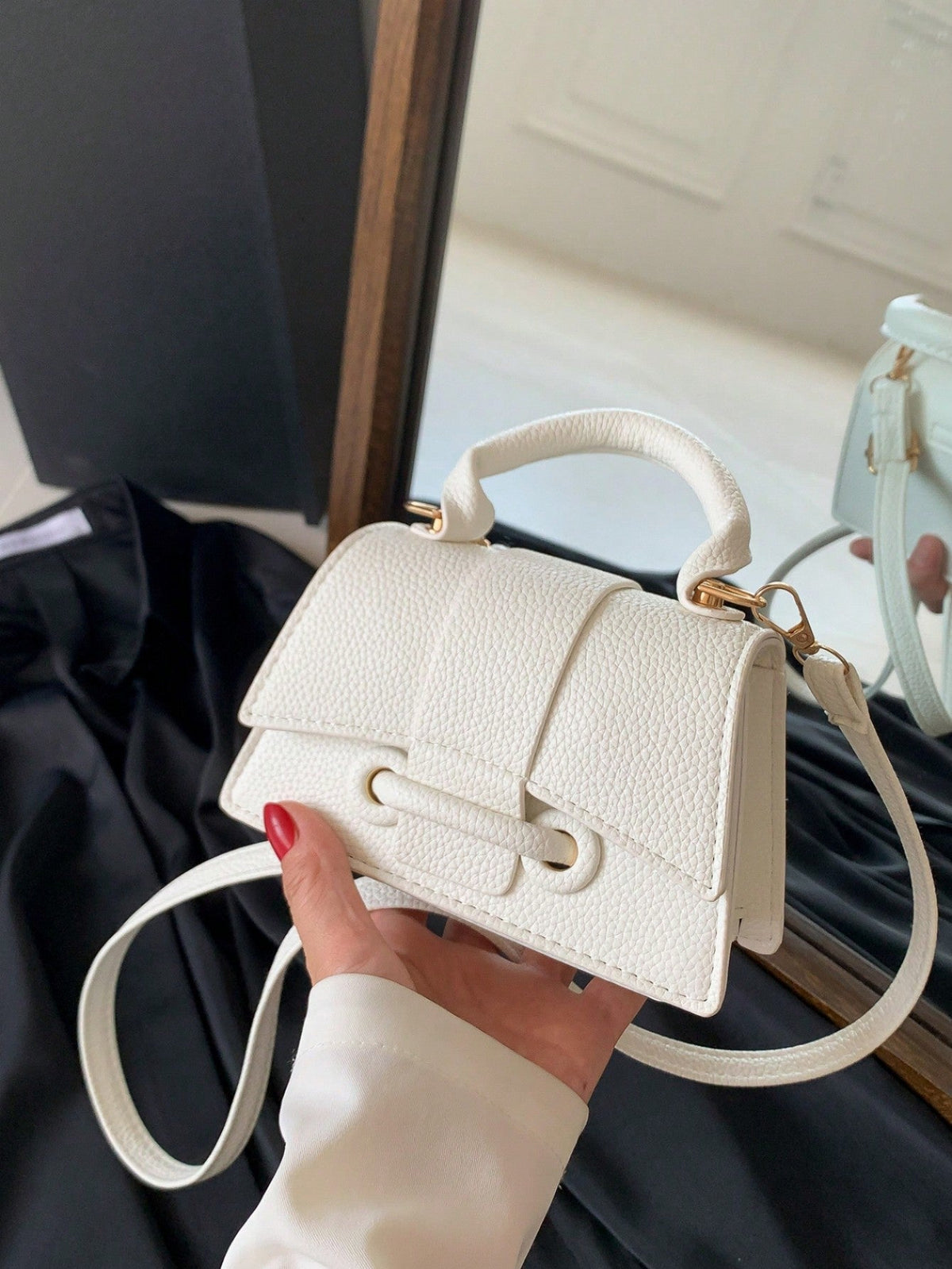 Kompakt mini håndtaske – bagvisning
