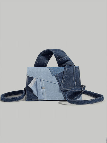 Sort denim skuldertaske til damer – nærbillede af materiale