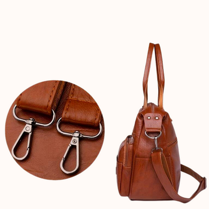 Detalje af justerbar rem på læder crossbody taske