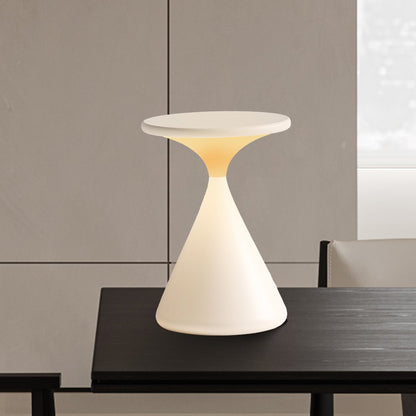 Nærbillede af touch-betjening på dæmpbar bordlampe