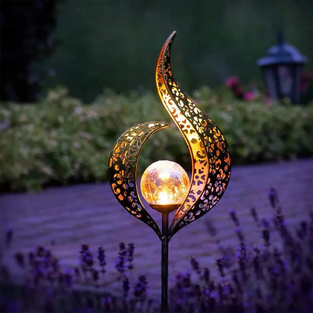 Solcellelampe i metal med varmt LED-lys til haven