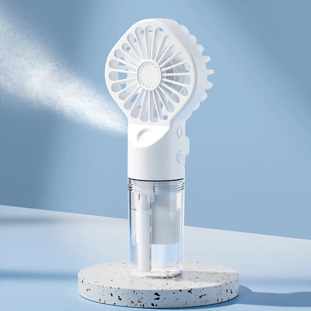 Kompakt håndventilator med vandspray – USB-genopladelig miniventilator til rejser og outdoor