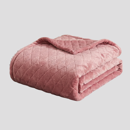 Lyserødt blødt velour tæppe til seng og sofa