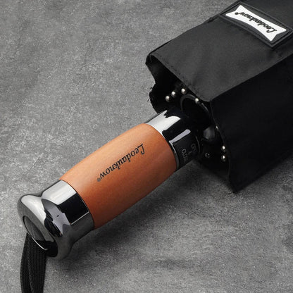 Automatisk paraply med bred dækning og professionelt foldbart design