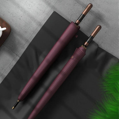 Robust stokparaply med solid og vindfast konstruktion